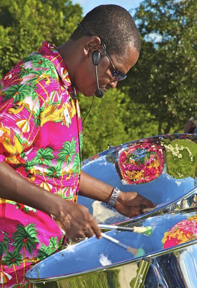Steel Drum Player Florida, Steel Drum Player from RythmTrail Steel Drum Band in Florida.Contact - www.rythmtrail.com Tel 866 495 4522